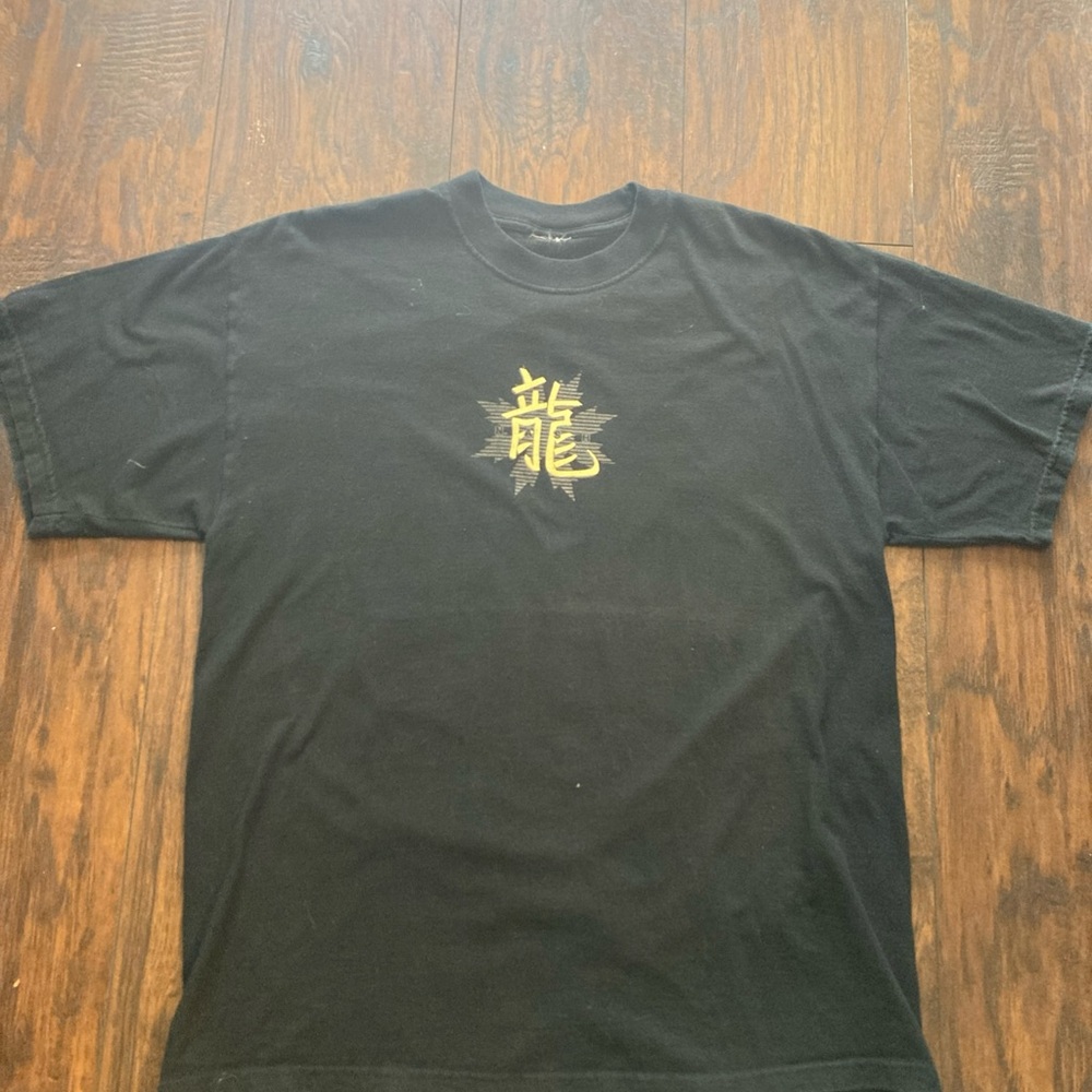 Vintage Nash skateboards black graphic t-shirt with a Chinese dragon logo.